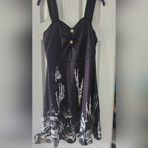 Black dress with skull hands, roses, and a butterfly. Size XL